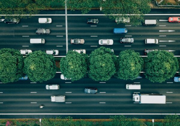 Aerial view of Motorway with vehicles driving along it