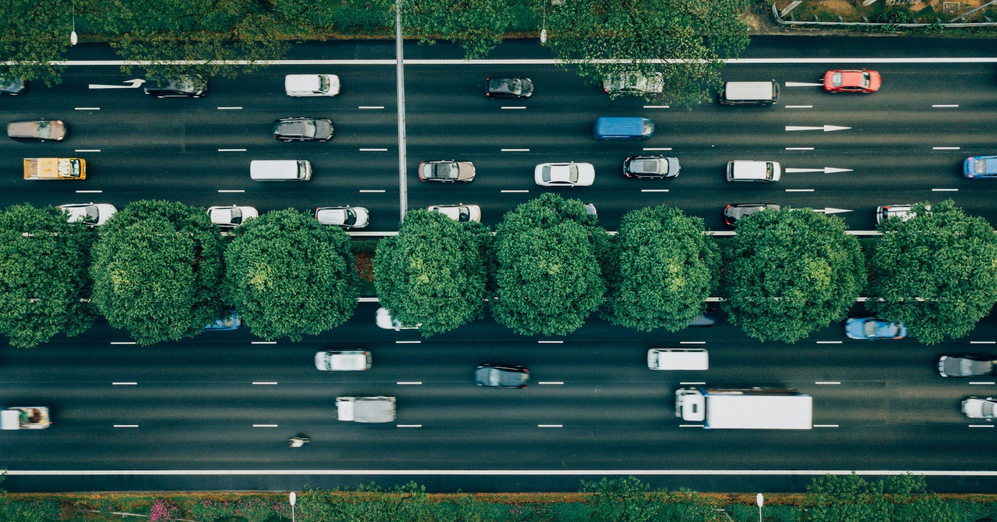Aerial view of Motorway with vehicles driving along it